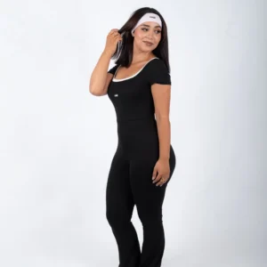 Black open back flare jumpsuit by Chai Nest